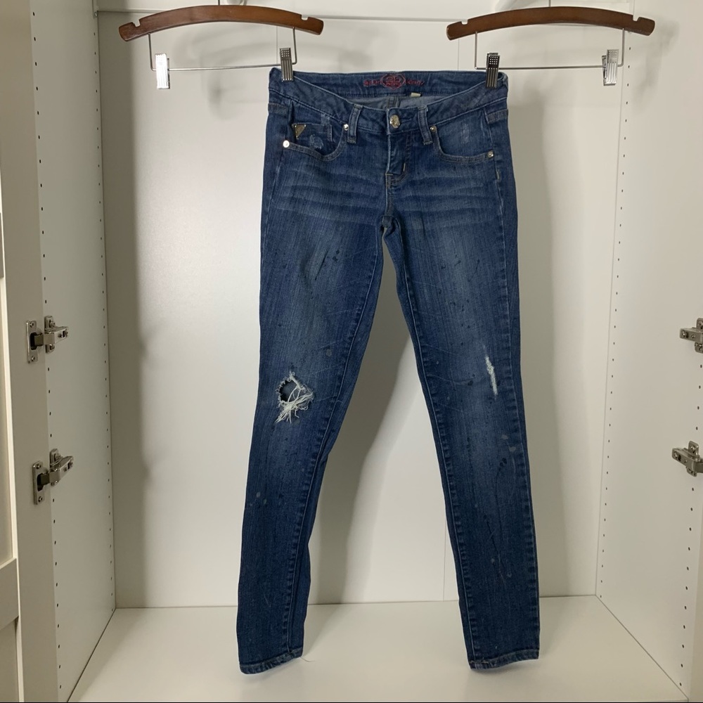 5/$25 Sale ☀️ Bebe Distressed Paint Splatter Siren Skinny Jeans